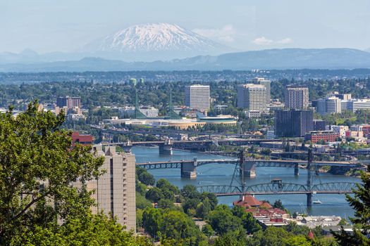 Portland Oregon downtown with bridges over Willamette River and Mount Saint Helens view