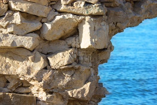 view in Greece. white stones and blue sea