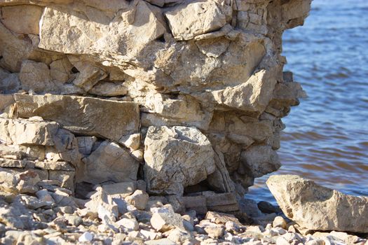 view in Greece. white stones and blue sea