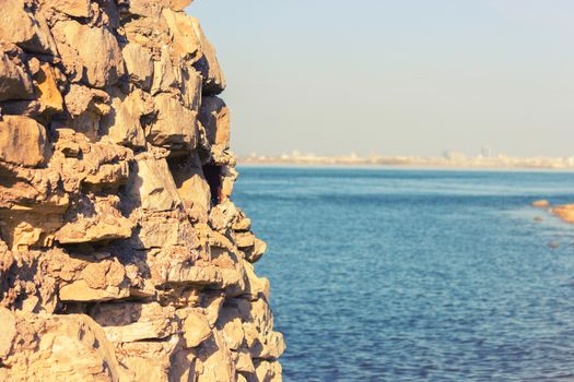 view in Greece. white stones and blue sea