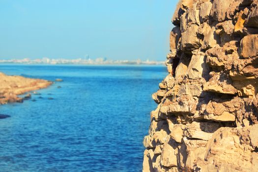 view in Greece. white stones and blue sea