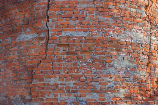 cracked brick wall. damage of war concept