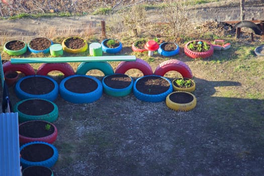 colorful Flower pots in a garden. handmade