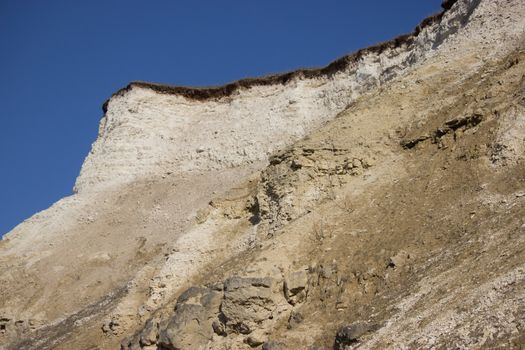 extraction of limestone concept. limestone mountain edge