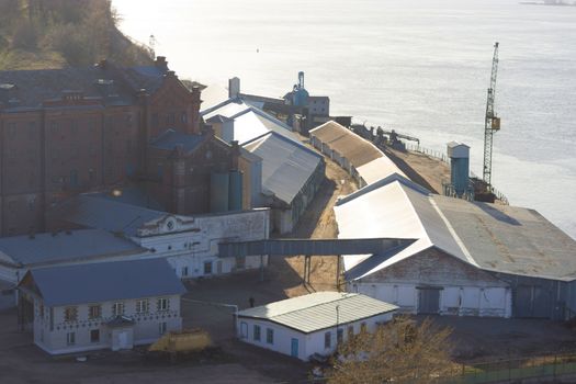 port or a factory on a river bank