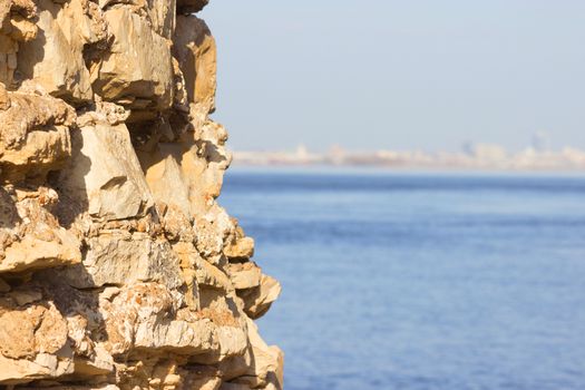 view in Greece. white stones and blue sea