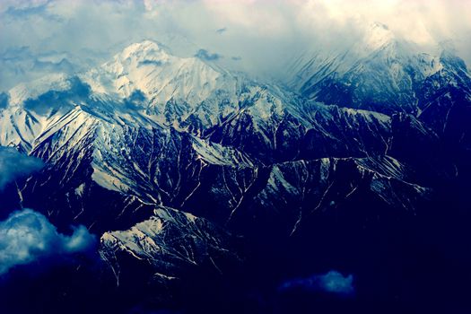 mountains with snow on top. aerial view from plain. Iran