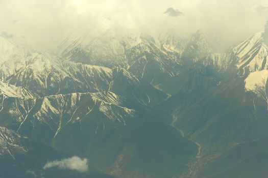 mountains with snow on top. aerial view from plain. Iran