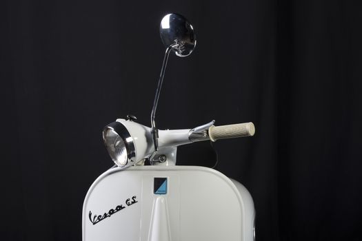 old white Vespa scooter