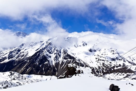 Winter landscape with snow mountains Caucasus region in Russia