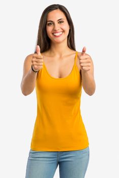 Portrait of a beautiful young woman with thumbs up