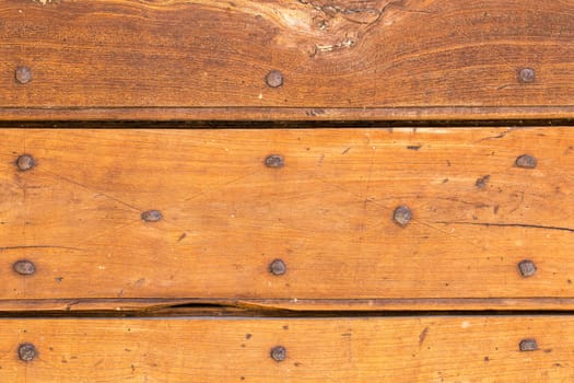 Close up of rustic old door in Spoleto, Italy.