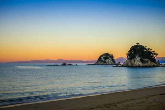 Creek and beach at sunset in Abel Tasman National Park. New Zealand