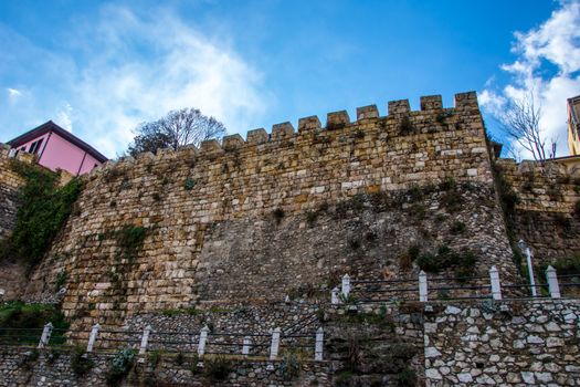 old wall of the castlle from ottoman period near the roud in city of Bursa Turkey