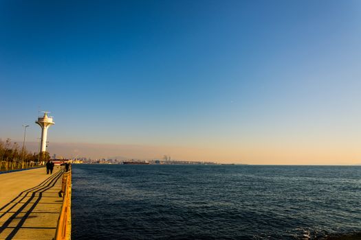 people walking along the coast in Istanbul