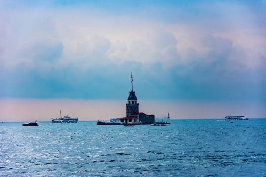 The Maiden's Tower from Byzantine period is a famous touristic destination in Istanbul city of Turkey