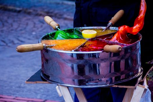 Man is selling Osmanli macunu candies on the street