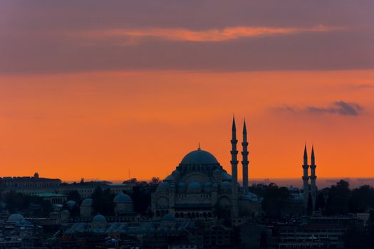 Istanbul cityscape with a famous Suleymaniye mosque at sunset