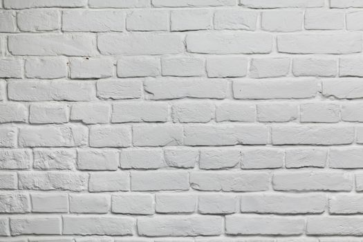 Old white painted brick wall background texture