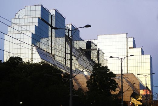 Modern Glass business building with reflections on windows