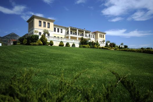 Beautiful large palace with stairs and lawn