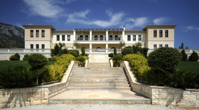 Beautiful large palace with stairs and lawn