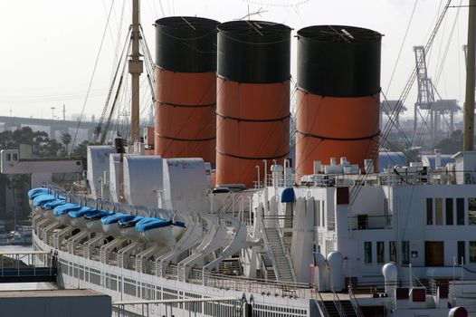 Close up detail of old cruise ship with three chimney