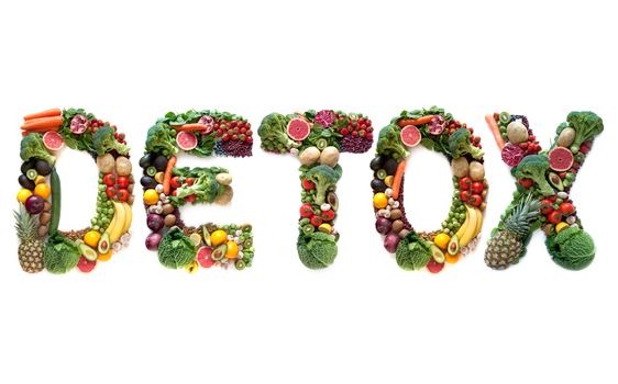 Detox spelt using large letters made of fruits and vegetables 