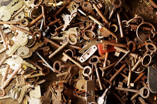 Close up view of many old rusty keys
