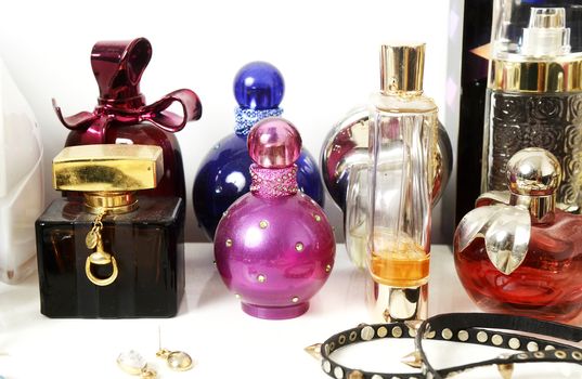 Close up view on perfumes on the table