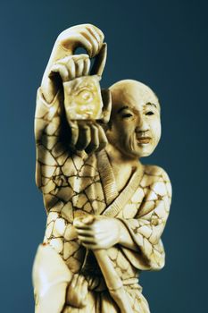 Small beautiful isolated shiny decorative porcelain figure