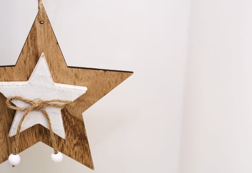 white wooden star shaped decoration hanging