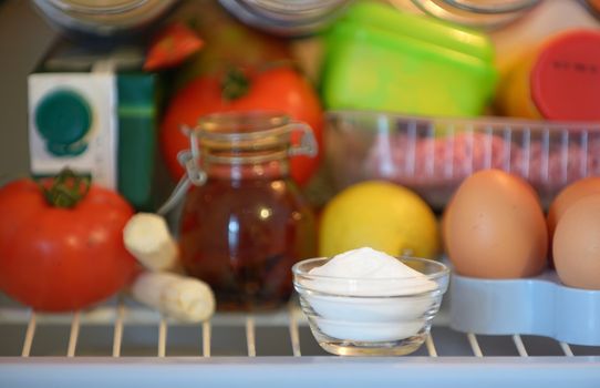 sodium bicarbonate inside of fridge, closeup