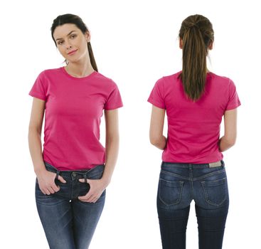 Photo of a beautiful brunette woman posing with a blank pink t-shirt, ready for your artwork or design.