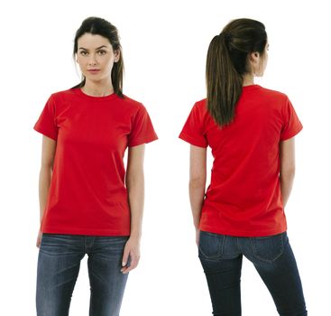 Photo of a beautiful brunette woman posing with a blank red t-shirt, ready for your artwork or design.