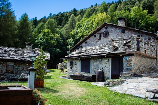 Beautiful rustic houses in the center of the Gran bosco park near Sauze d'Oulx