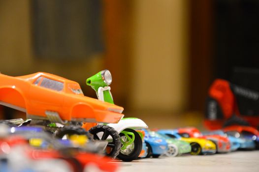 many toy cars in line