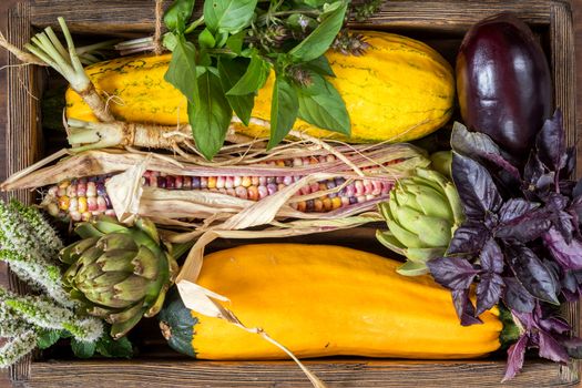 Fresh organic vegetables wooden floor with copy space. Green, yellow and multicolor vegetables background. Healthy eating background. Vegetarian food, organic food.