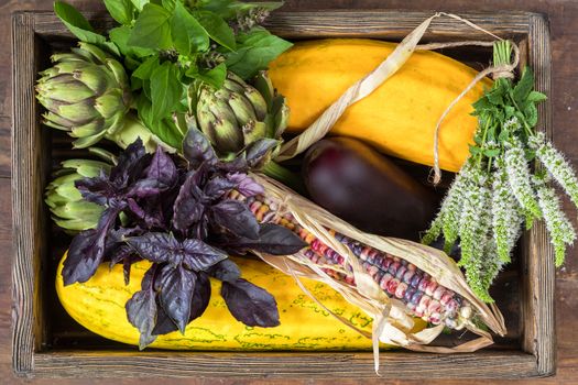 Fresh organic vegetables wooden floor with copy space. Green, yellow and multicolor vegetables background. Healthy eating background. Vegetarian food, organic food.
