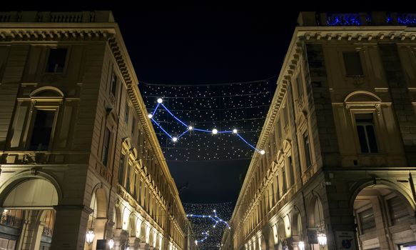 Christmas lights in Turin with constellations and astronomy theme. Night outdoor shot