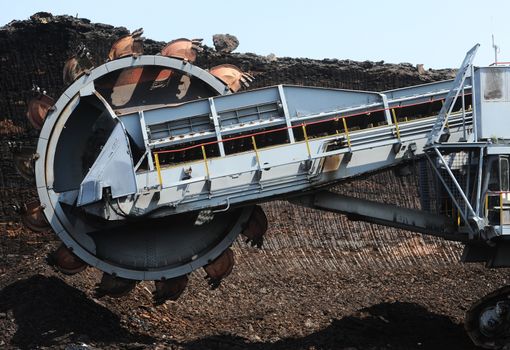 View on large surface coal mine on sunny day