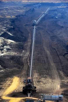 View on large surface coal mine on sunny day