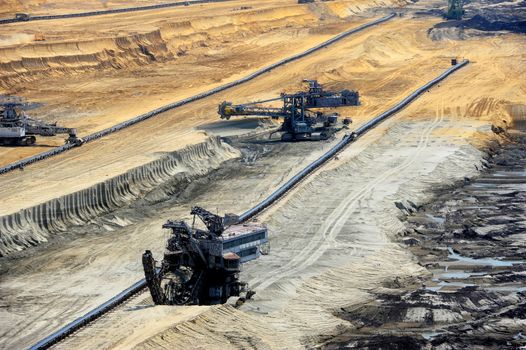 View on large surface coal mine on sunny day
