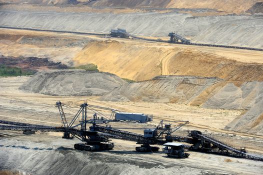 View on large surface coal mine on sunny day