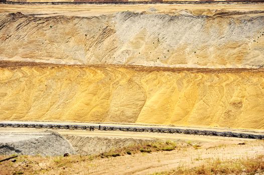 View on large surface coal mine on sunny day