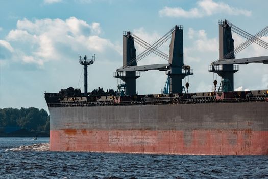 Black bulker ship. Logistics and merchandise transportations