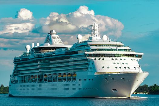 Luxury cruise liner underway. Tour travel and spa services