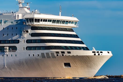 White cruise liner sailing on a clear day