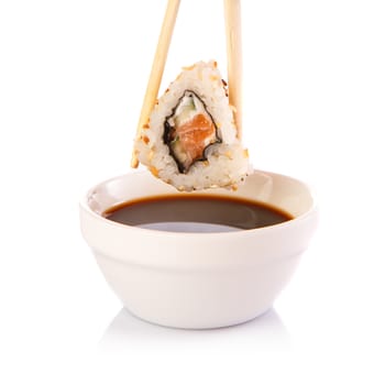 Roll the delicious sushi on a white background.