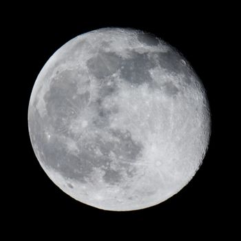 Photos of the full moon in the night sky.